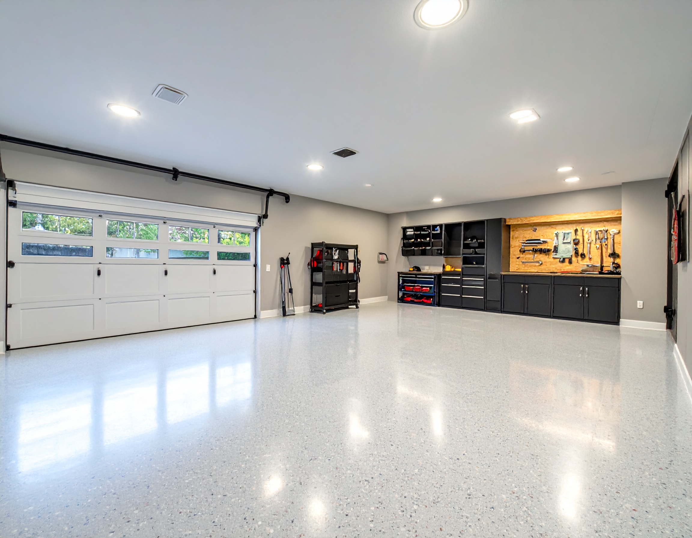 Epoxy flake flooring with premium storage wall and tool organization